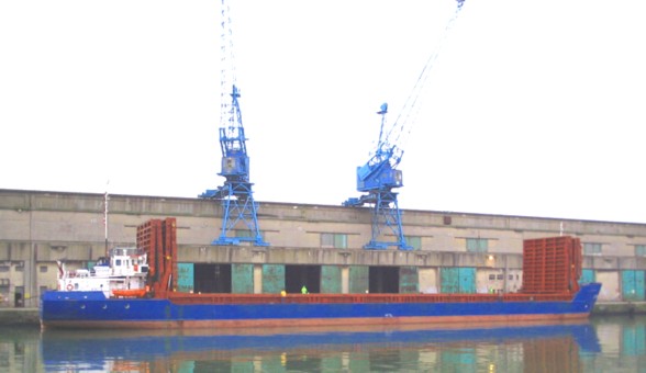 vessel unloading timber at liverpool docks